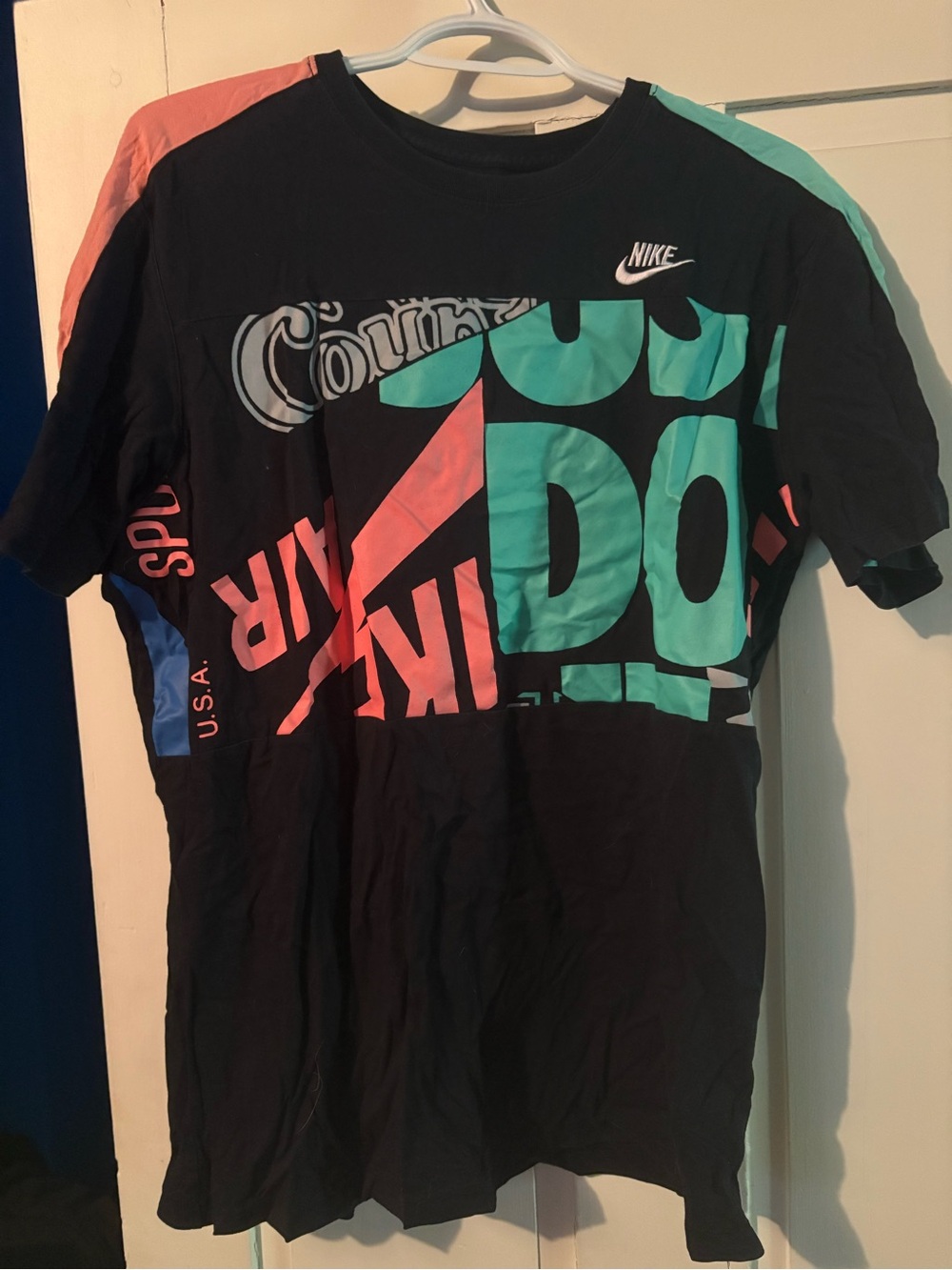 Nike Black Short Sleeve Graphic Tee with Teal and Coral Accents